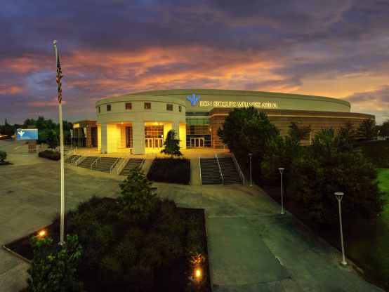 Bon-Secours-Wellness-Arena-Exterior-Sunset-01a5ca715056a36_01a5d2f3-5056-a36f-2373addfb28657bc.avif